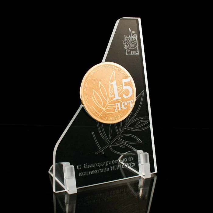 Corporate medal on an acrylic stand